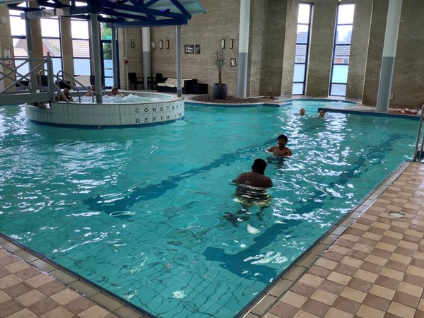 Two people in a swimming pool