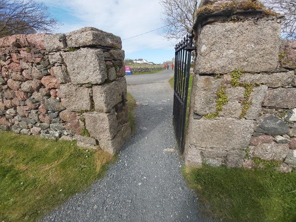 Image of a gate leading to the Nunnery grounds.