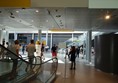 The view as you emerge from the lift into the spacious underground foyer and retail area