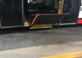 The electronic ramp on the bus.