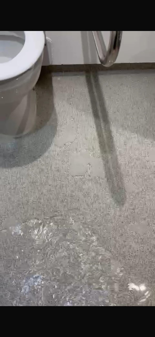 Flooded bathroom floor