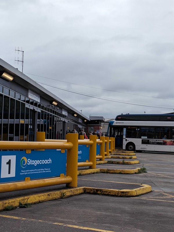 A bus parked in a parking lot