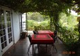 Picture of Impangele Gust House - The breakfast deck ... awesome in summer with hummingbirds all around you :)