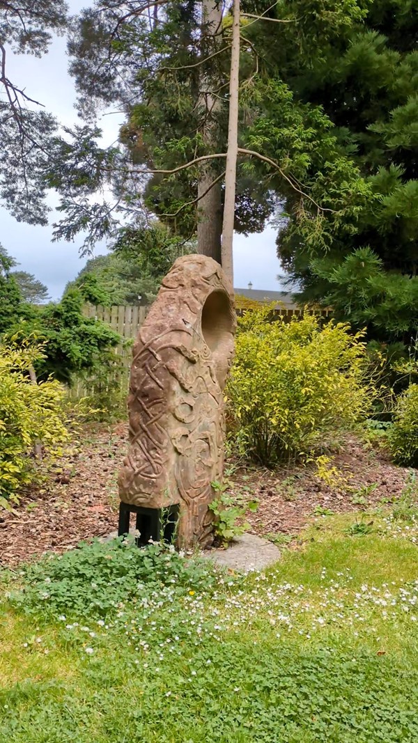 Image of a stone sculpture in a garden