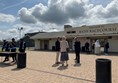 Image of a group of people outside of a building