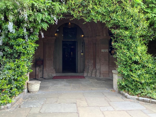 Picture of a door surrounded by foliage