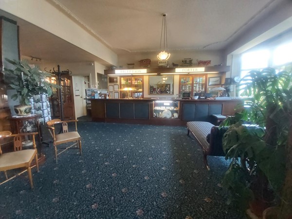 Image of a room with tables and chairs