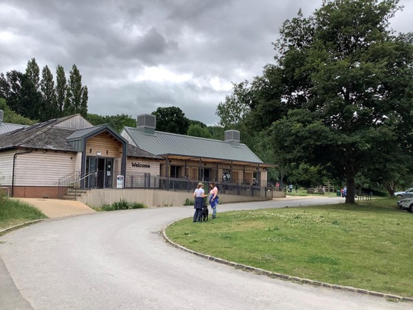 Wooden building with welcome on it