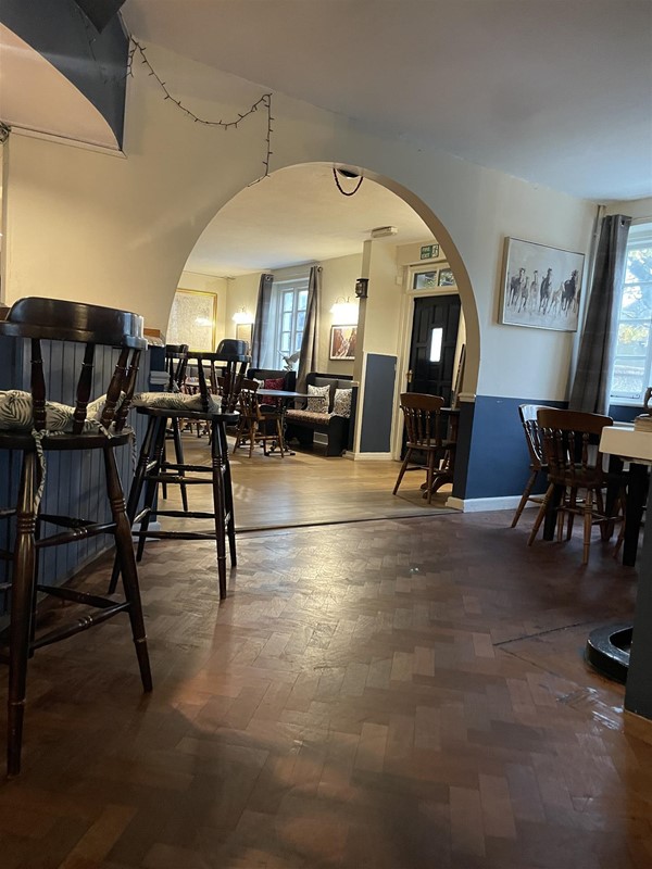 Image of tables and chairs in a building