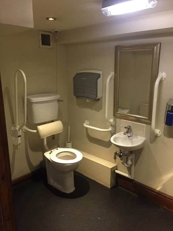 Accessible loo is a good size, clean and with emergency cord.