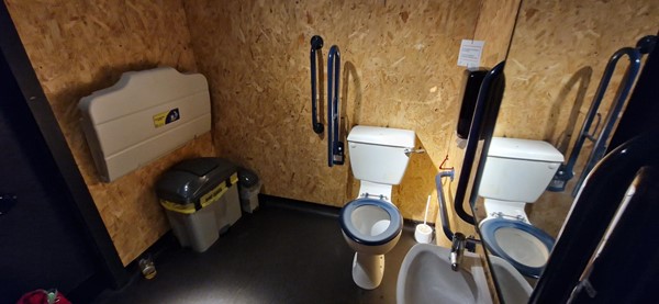 Accessible toilet with baby change.