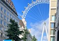 Image of the London Eye in the city