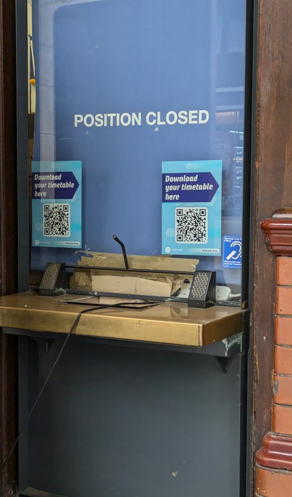 Image of the ticket office window closed.