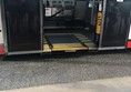 The electronic ramp on the bus.