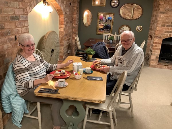 Picture of two people dining