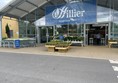 Image of a store with a big glass front door