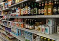 Shelves with a variety of soft drinks and milks