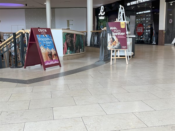 Image of the ramp leading down to Costa Coffee.