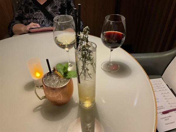 Image of a table with a drink on it