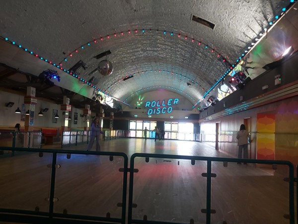 Image of a roller disco in a room