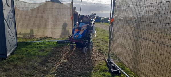 Image of a wheelchair user in a field