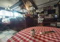 Image of a table with a red and white checkered tablecloth