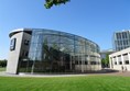 The museum's entrance building is linked with the main gallery by a broad underground corridor