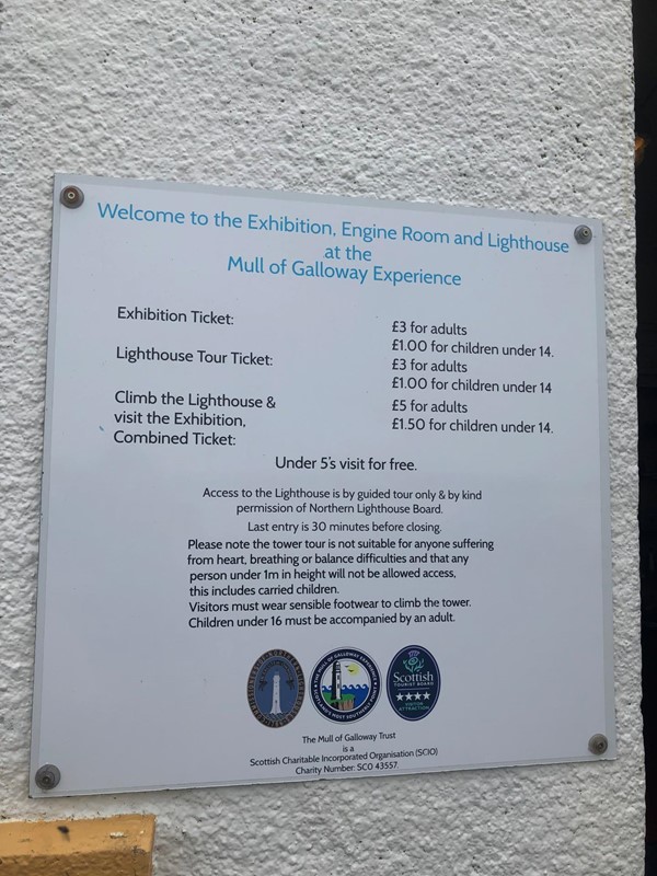 Picture of a sign with the entrance fees on