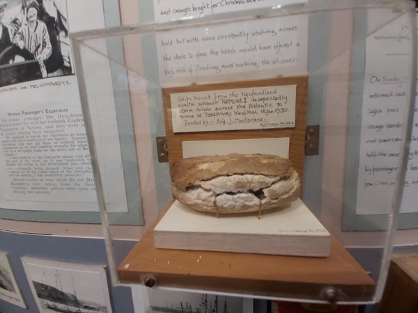 Image of a loaf of bread in a glass case