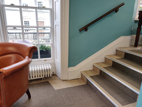 Steps leading up to the inaccessible first floor mezzanine area.