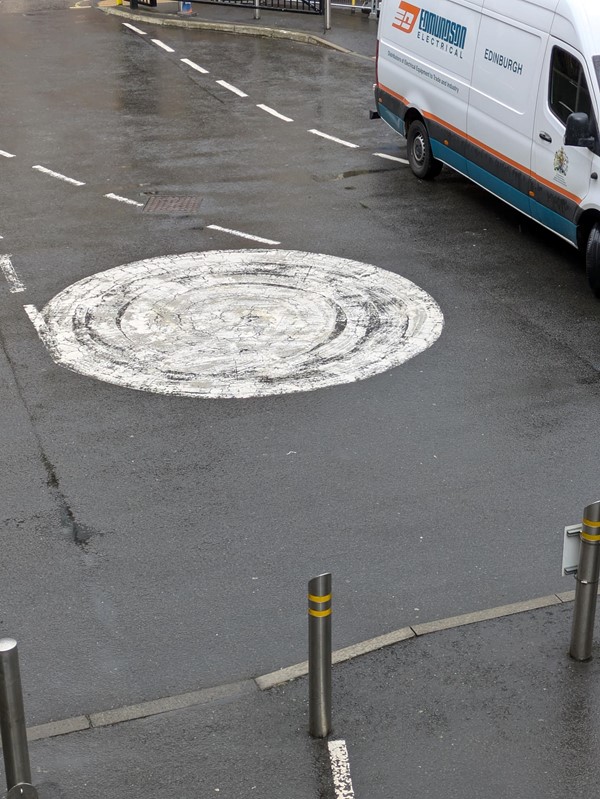 Image of a roundabout at the drop off area on Calton Street