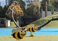 Image of two spring rockers, designed to look like bees