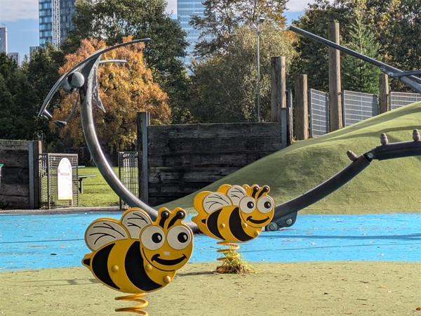 Image of two spring rockers, designed to look like bees