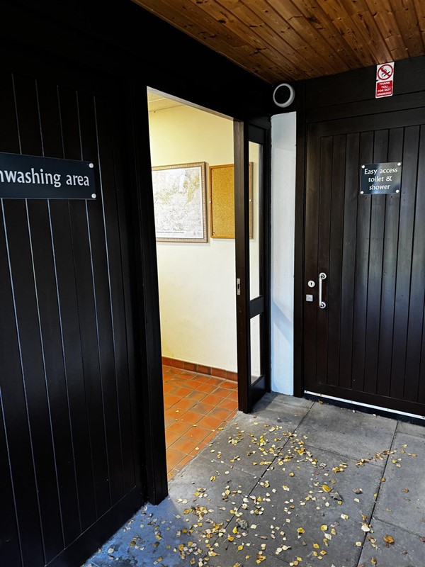 Entrance to dishwashing / easy access bathroom