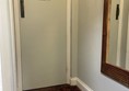 Image of a door in a corridor