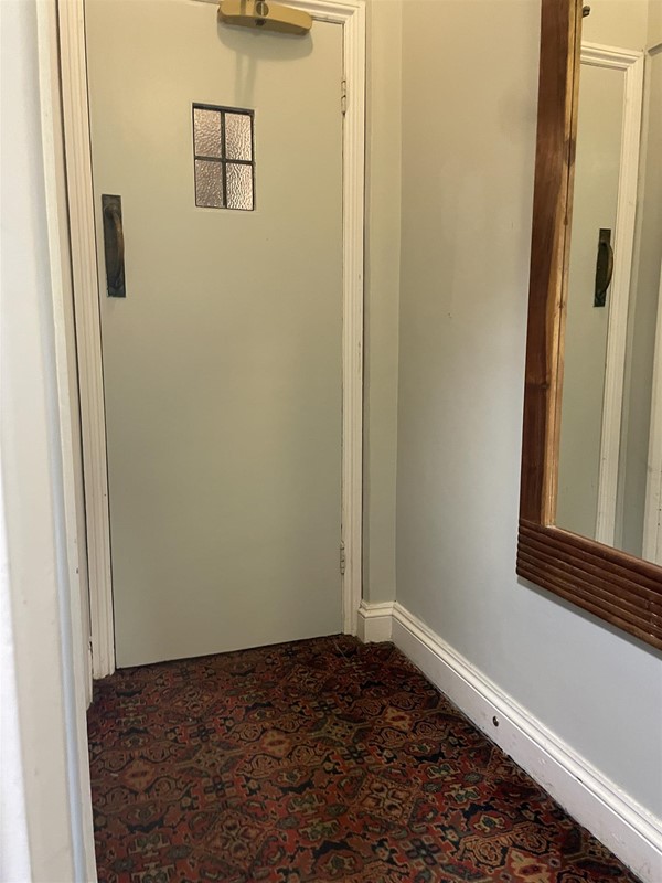 Image of a door in a corridor