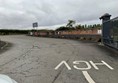 Image of a road with a sign on it