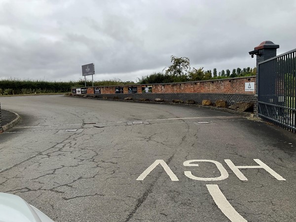 Image of a road with a sign on it