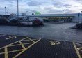 Photo of Asda and car park.