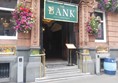 Image of an entrance to a building with flowers