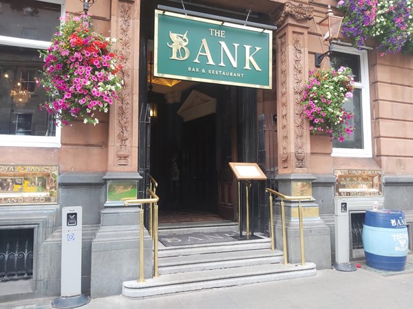 Image of an entrance to a building with flowers