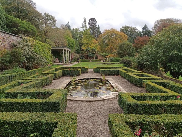 Hedge garden with gravel surface.