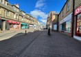 The view along Channel street with the Vodafone store on the right of the picture