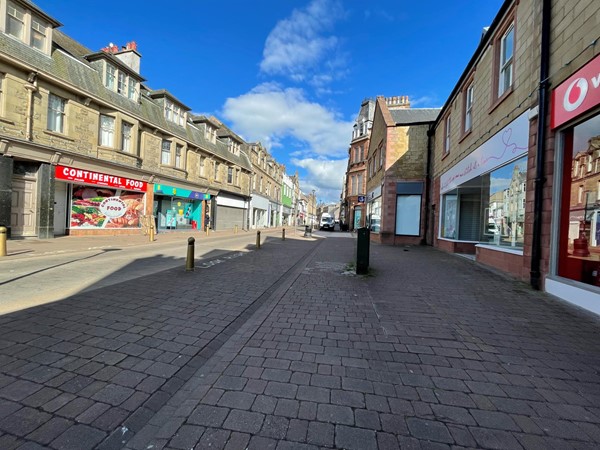 The view along Channel street with the Vodafone store on the right of the picture