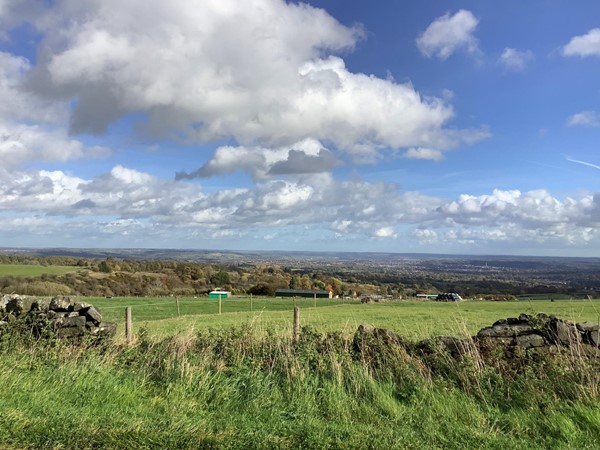 Fields with farm buildingd