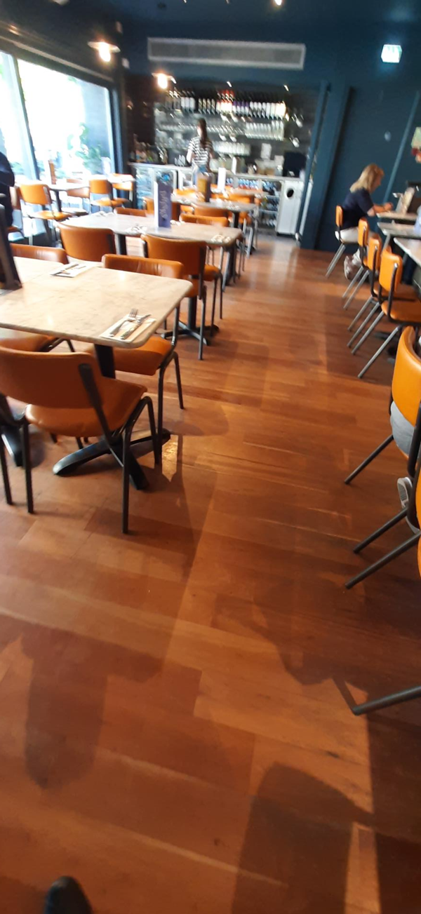 Image of a room with tables and chairs