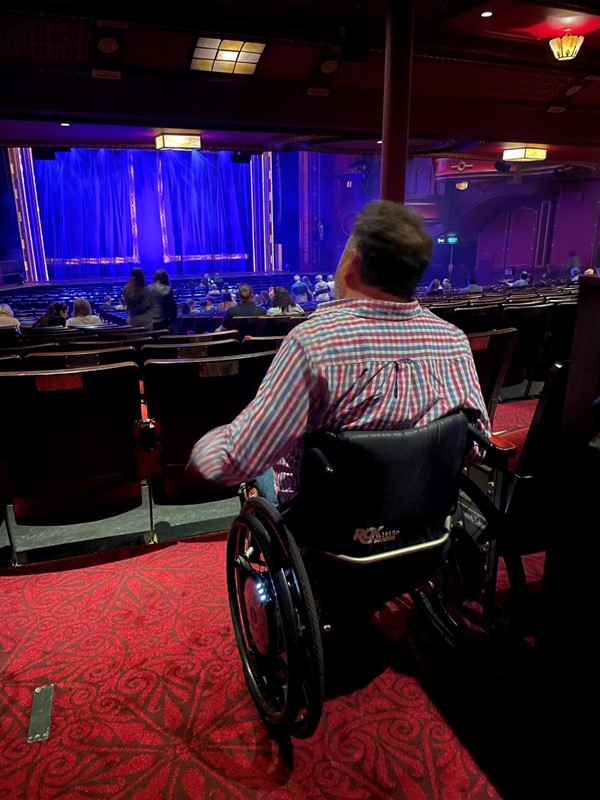 Image of a person in a theatre