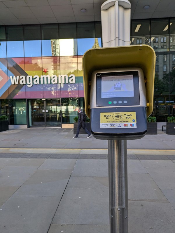 Image of tap in/tap out terminal - Wagamama is in the background