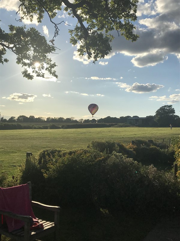 Image of more scenery showing a hot air balloon