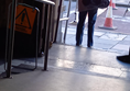 The lady's standing on the metal ramp which crosses the threshold at the George St entrance. It's pretty gentle. The other ramp (foreground) isn't nearly as scary as I feared - the metal frame of the yellow sign is about three feet high, so hopefully that gives a sense of scale and steepness. So if you're worried about the gradient like I was - please don't be!